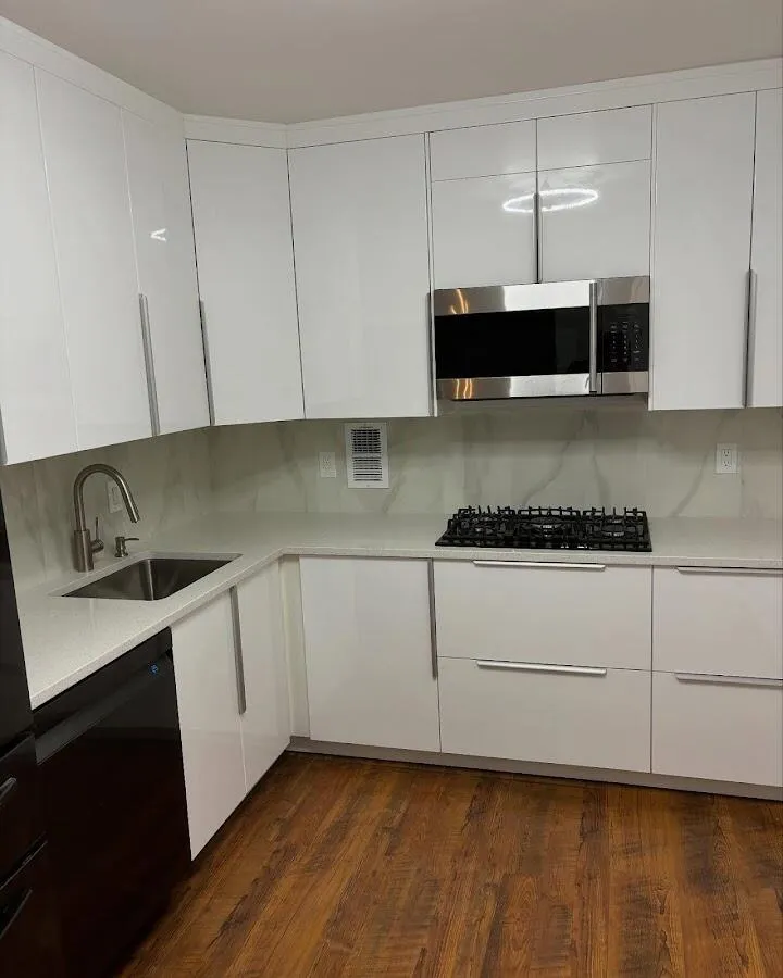 Restored kitchen with white cabinets after water damage in Temple Terrace